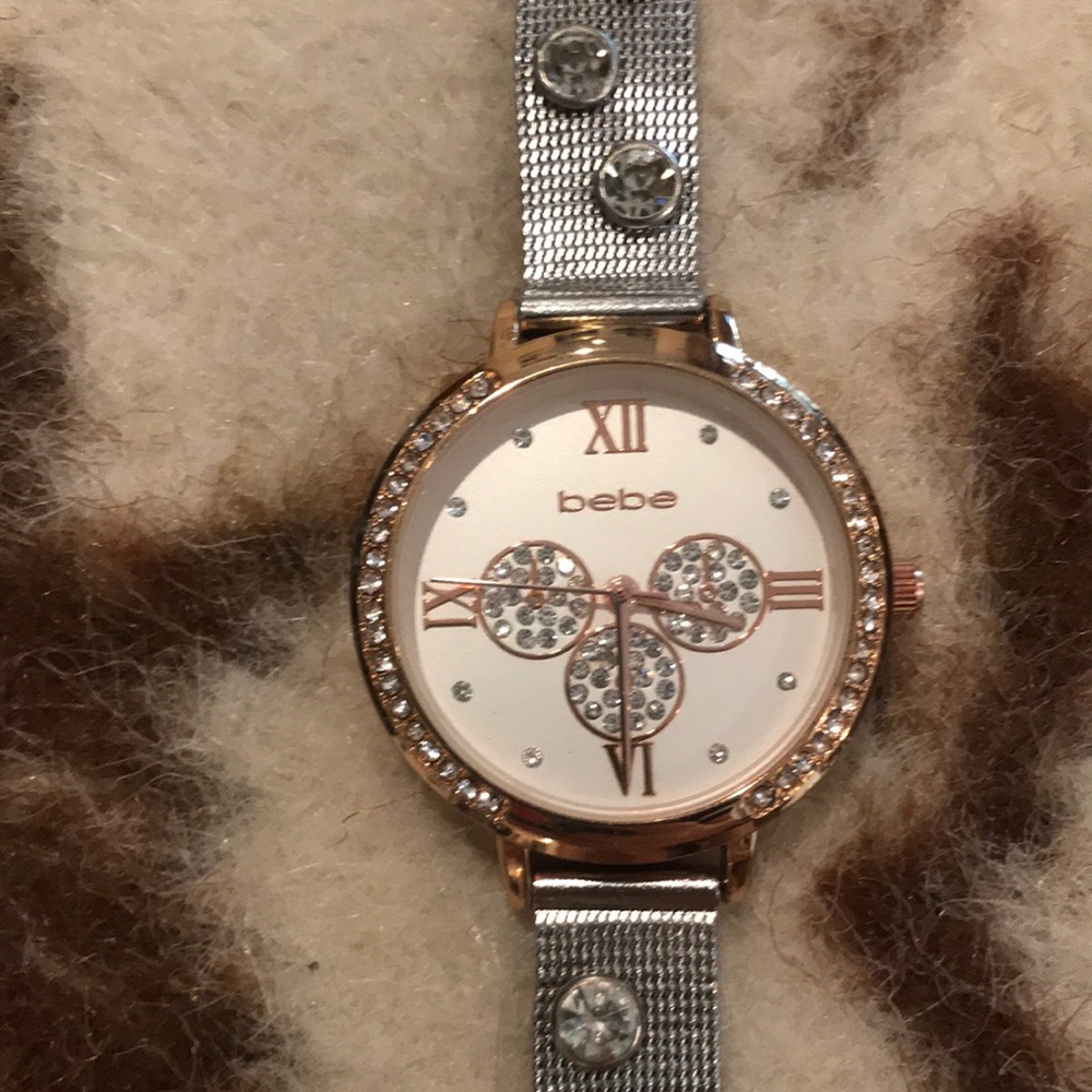 Bebe Watch. Silver and gold colors.